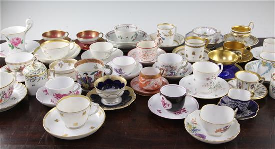 A collection of twenty eight Continental porcelain tea and coffee cups and saucers and four other cups, late 18th - early 20th century,